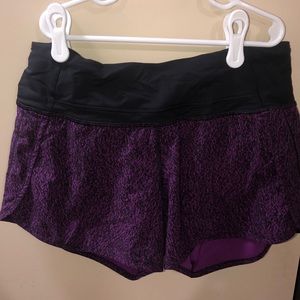 Purple and black lululemon shorts